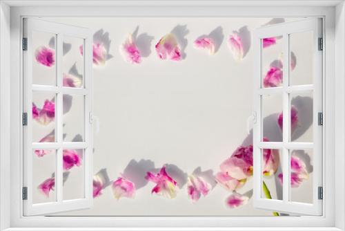 Fototapeta Naklejka Na Ścianę Okno 3D - Trendy layout with peony pink flower and peony petal, on white background. Minimal spring concept in hard light and shadow. Floral garden design.