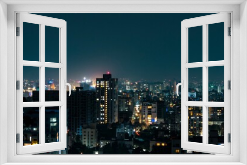 Fototapeta Naklejka Na Ścianę Okno 3D - Cityscape at night