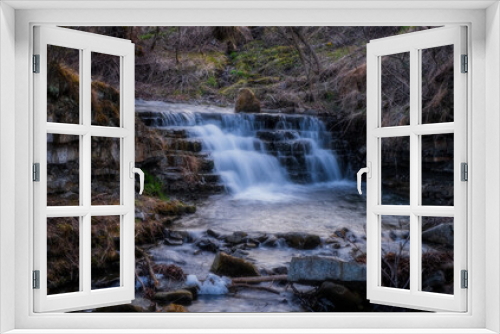 Fototapeta Naklejka Na Ścianę Okno 3D - Waterfall Zalotomyatyi at the Zalotomyatyi river in carpatian mountains and green forest. National park Skolivski Beskidy. April 2020