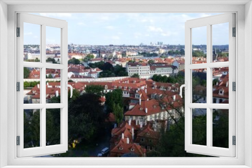 Fototapeta Naklejka Na Ścianę Okno 3D - view of the old city of Prague with red roofs from the hill