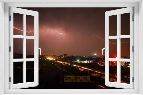 Fototapeta Naklejka Na Ścianę Okno 3D - Lightning storm over city in mumbai light after cyclone / Lightning with dramatic clouds . Night thunder-storm 