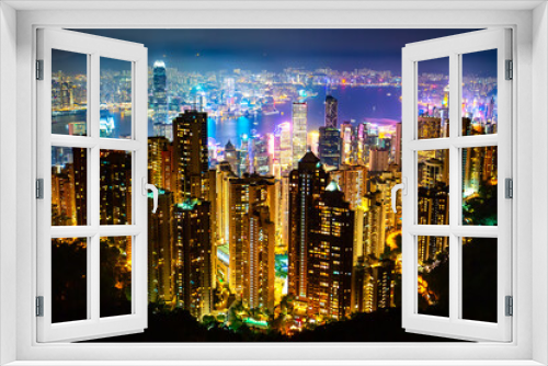 Fototapeta Naklejka Na Ścianę Okno 3D - Hong Kong skyscrapers skyline cityscape view from Victoria Peak illuminated in the evening. The most famous view of Hong Kong at twilight sunset. Hong Kong, special administrative region in China.