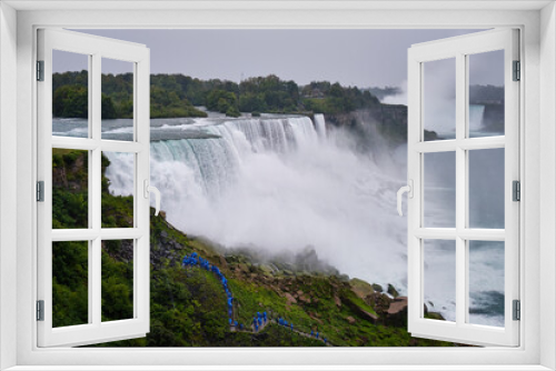 Fototapeta Naklejka Na Ścianę Okno 3D - Tourists watching the rapids of the Niagara falls