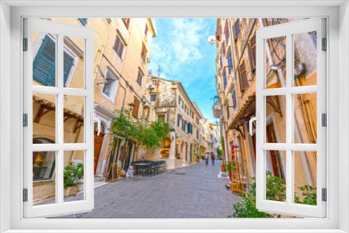 Fototapeta Naklejka Na Ścianę Okno 3D - CORFU, GREECE, July 9, 2019 : The colourful houses in the streets of Corfu Town, Corfu, Greece