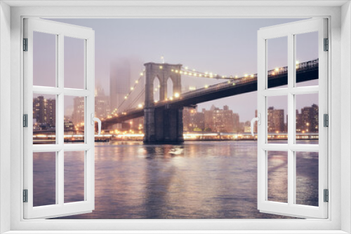 Fototapeta Naklejka Na Ścianę Okno 3D - Brooklyn Bridge on a foggy night, color toned picture, New York City, USA.