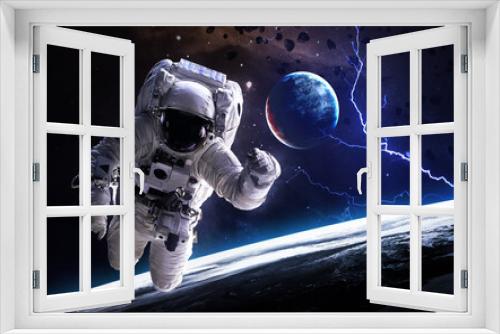 Fototapeta Naklejka Na Ścianę Okno 3D - Astronaut in deep space