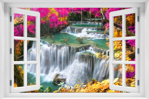 Fototapeta Naklejka Na Ścianę Okno 3D - Beauty in nature, beautiful waterfall flowing of water with turquoise color of water in colorful autumn forest at fall season