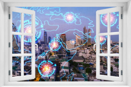 Multi exposure of Bangkok cityscape sunrise background and world map hologram. Concept of media networking.