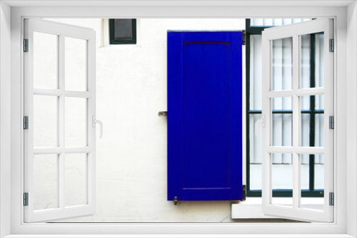 Fototapeta Naklejka Na Ścianę Okno 3D - House with blue shutter window