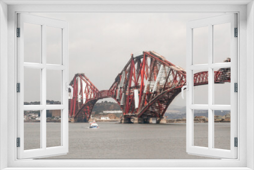 Fototapeta Naklejka Na Ścianę Okno 3D - Edinburgh, Scotland. Painting, maintenance and repair works in the Forth Rail Bridge, as seen from South Queensferry