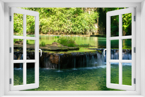 Fototapeta Naklejka Na Ścianę Okno 3D - Waterfall in deep tropical rain forest green tree