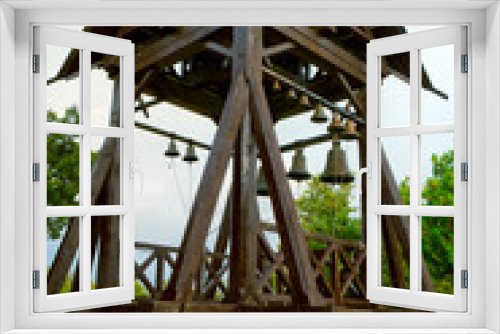 Fototapeta Naklejka Na Ścianę Okno 3D - Ancient church bells on belfry wooden  tower