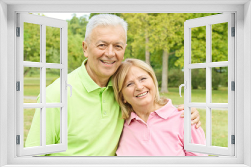 Portrait of happy senior couple outdoors