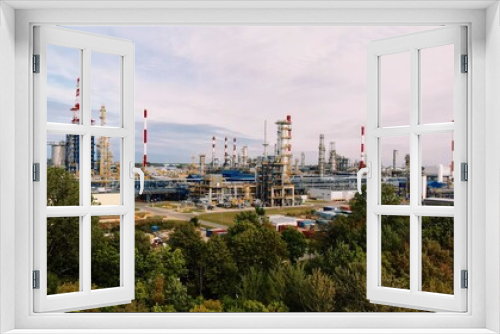 Fototapeta Naklejka Na Ścianę Okno 3D - Aerial shot over a pipe infrastructure in an oil refinery in Gdansk, 