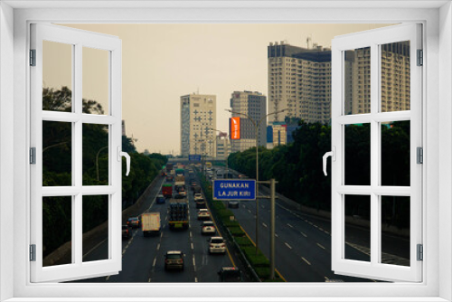 Fototapeta Naklejka Na Ścianę Okno 3D - The atmosphere of traffic on the Jakarta toll road, 13 June 2020.