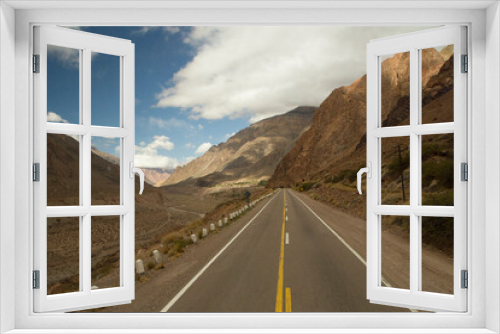 Fototapeta Naklejka Na Ścianę Okno 3D - Rural road. Traveling along the asphalt highway high in the mountains.