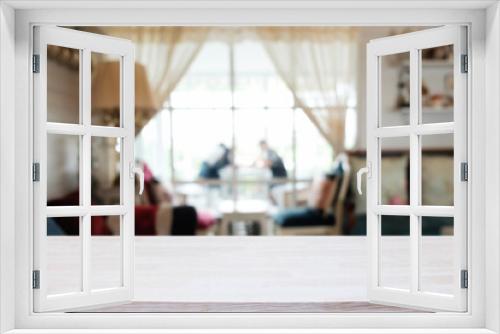 Empty wooden table space platform and blurred restaurant or coffee shop background for product display montage.