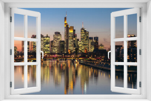 Fototapeta Naklejka Na Ścianę Okno 3D - Panorama of the skyline Frankfurt am Main at twilight