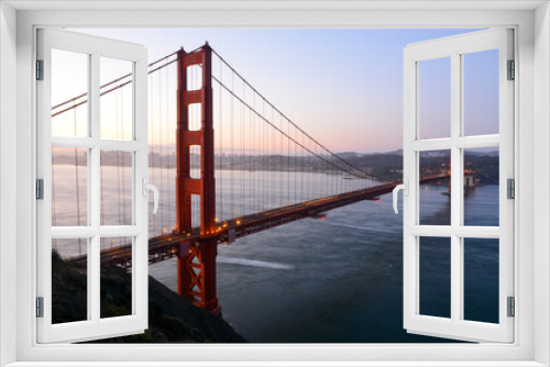 Fototapeta Naklejka Na Ścianę Okno 3D - San Francisco California USA - August 17, 2019: Golden Bridge viewed from Battery Spencer at sunrise