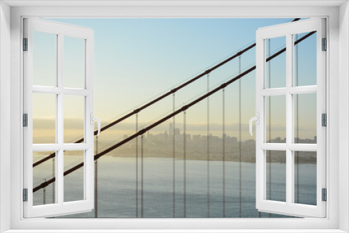 Fototapeta Naklejka Na Ścianę Okno 3D - San Francisco California USA - August 17, 2019: Golden Bridge viewed from Battery Spencer at sunrise