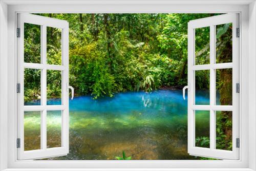 Fototapeta Naklejka Na Ścianę Okno 3D - Rio Celeste with turquoise, blue water. Connection of two rivers and chemical reaction, water become blue - turquoise. Tenorio national park Costa Rica. Central America.