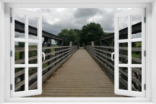 Fototapeta Naklejka Na Ścianę Okno 3D - wooden bridge in the forest
