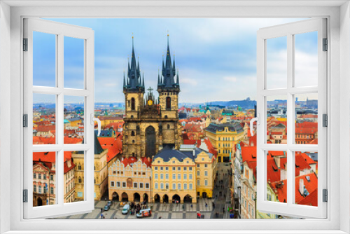 Fototapeta Naklejka Na Ścianę Okno 3D - Panroamic view over traditional red roofs in old town onto Famous Church of our lady before Tyn in Prague, Czech Republic