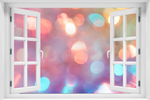 Multicolored defocused bokeh lights background - horizontal wallpaper, poster. Stylish, festive and elegance shot. Trendy colors. Illuminated, lights, glitter effects. Celebrative decoration.