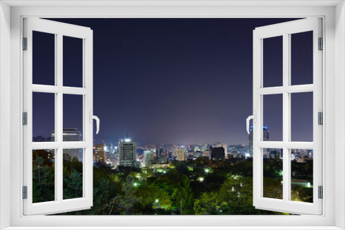 Fototapeta Naklejka Na Ścianę Okno 3D - Seoul skyline and Namsangol Hanok Village at night