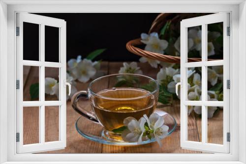 Fototapeta Naklejka Na Ścianę Okno 3D - Fresh white jasmine flowers on a wooden table. Jasmine tea.