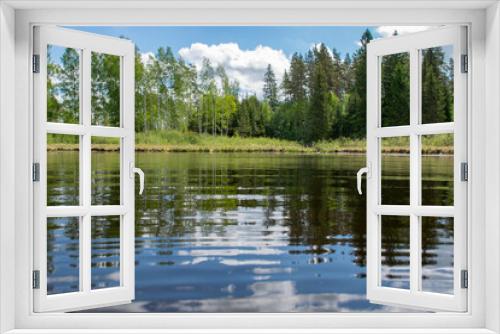 Fototapeta Naklejka Na Ścianę Okno 3D - summer landscape with lake and white cloud reflections in the water, tree silhouettes reflect in the lake water