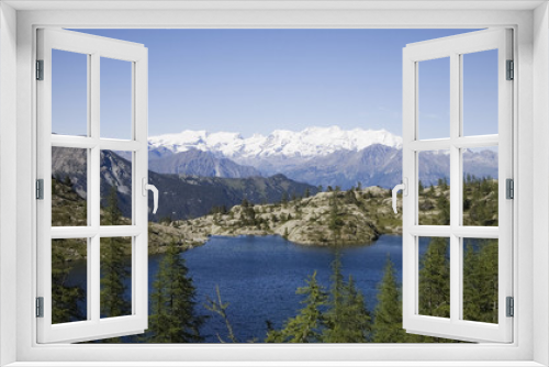 Fototapeta Naklejka Na Ścianę Okno 3D - lago alpino con sullo sfondo cervino e monte rosa
