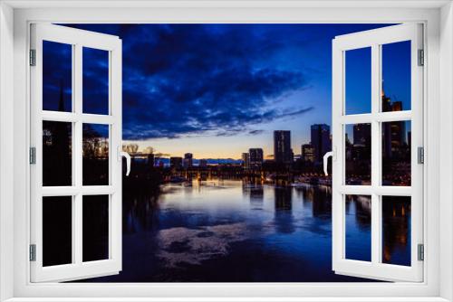 Fototapeta Naklejka Na Ścianę Okno 3D - Spectacular view on the night city of Frankfurt reflecting in the river