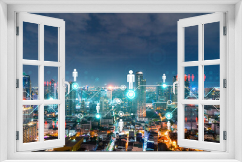 Fototapeta Naklejka Na Ścianę Okno 3D - Glowing Social media icons on night panoramic city view of Bangkok, Asia. The concept of networking and establishing new connections between people and businesses. Double exposure.
