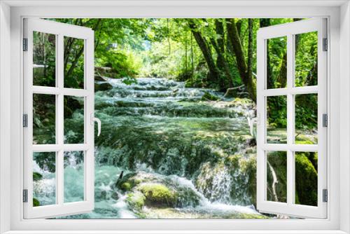Fototapeta Naklejka Na Ścianę Okno 3D - Beautiful waterfall in green forest