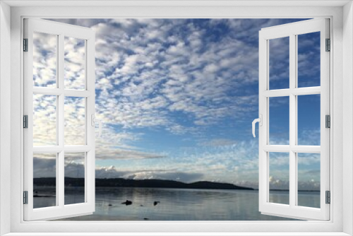 Fototapeta Naklejka Na Ścianę Okno 3D - cloud front over water