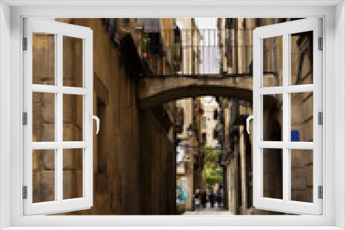 Fototapeta Naklejka Na Ścianę Okno 3D - alley of the gothic quarter in barcelona