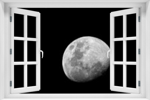 Fototapeta Naklejka Na Ścianę Okno 3D - waxing gibbous moon over black