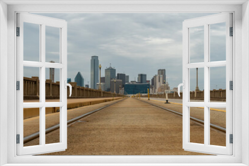 Fototapeta Naklejka Na Ścianę Okno 3D - Low Angle View Tracks Leading into Downtown Dallas City