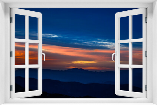 Fototapeta Naklejka Na Ścianę Okno 3D - Colorful, vibrant, burning sunset skies, dramatic clouds  Himalayan mountains on Trek to Dalhousie