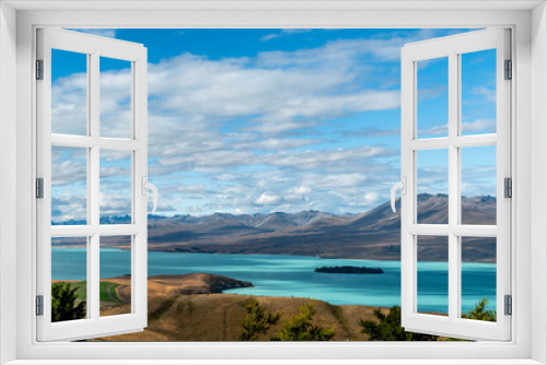 Fototapeta Naklejka Na Ścianę Okno 3D - A view of Lake Tekapo in New Zealand.