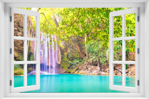 Fototapeta Naklejka Na Ścianę Okno 3D - Tropical landscape with beautiful waterfall, emerald lake and green tree in wild jungle forest. Erawan National park, Kanchanaburi, Thailand