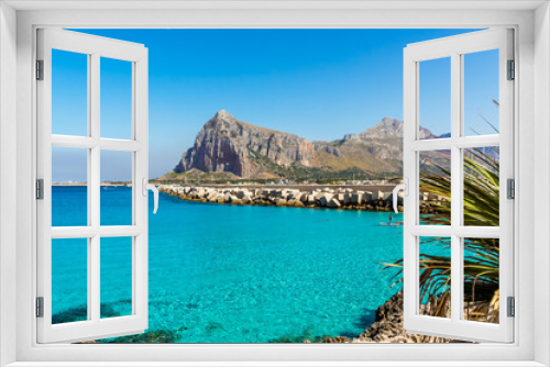 Fototapeta Naklejka Na Ścianę Okno 3D - The idyllic waters of San Vito lo Capo, Sicily with impressive mountain backdrop in summer