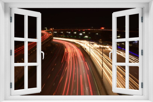 Fototapeta Naklejka Na Ścianę Okno 3D - Long exposure car light at night