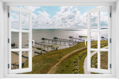 Fototapeta Naklejka Na Ścianę Okno 3D - Piers over the Coast