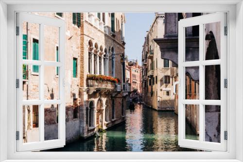 Fototapeta Naklejka Na Ścianę Okno 3D - Narrow canal of Venice in Italy