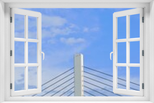 Fototapeta Naklejka Na Ścianę Okno 3D - Architecture details of strong suspension bridge in blue sky background