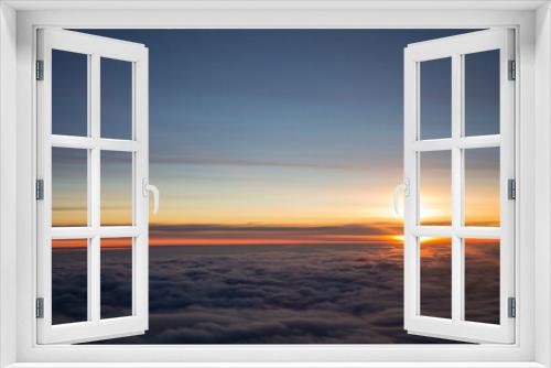 Fototapeta Naklejka Na Ścianę Okno 3D - sunset above the clouds