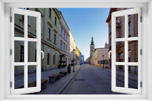 Fototapeta Naklejka Na Ścianę Okno 3D - Cracow, Old Town district, old tenements in Grodzka street