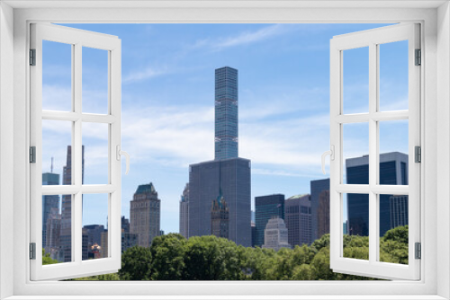 Fototapeta Naklejka Na Ścianę Okno 3D - Midtown Manhattan Skyline seen From Central Park in New York City during Spring
